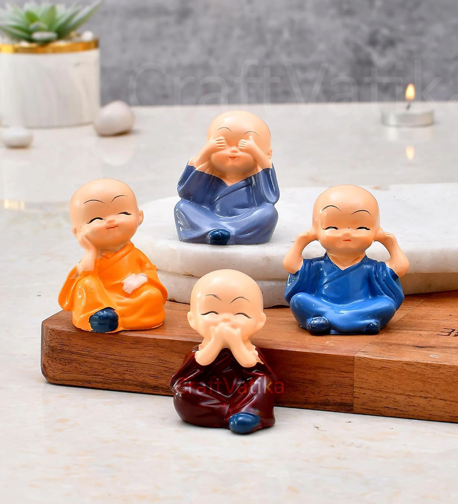 Buddha Monk Multicolour Polyresin (Set of 4) Showpieces
